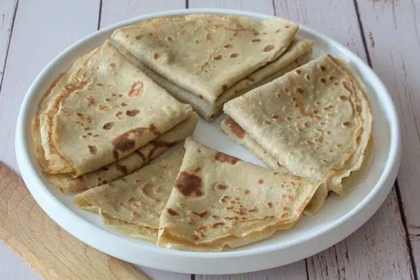 Crêpes de farine de sorgho à la sauce mangue